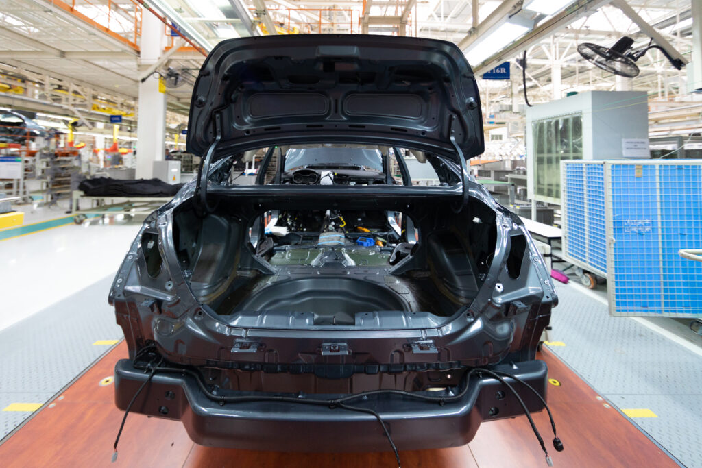 Automated car Assembly line. The plant of the automotive industry. Line of car body